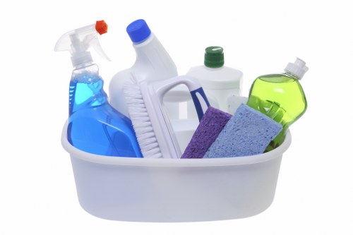 Office cleaners working in a Camden business workspace