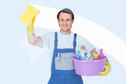 Professional cleaners maintaining desks and communal spaces in Camden