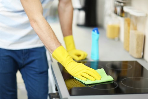 Deep cleaning a corner sofa in a Camden property
